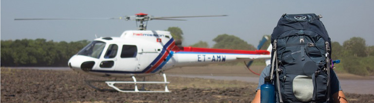 Man walking towards helicopter, 3rd World Mission Outreach, Mission To Ethiopia, OCFEP